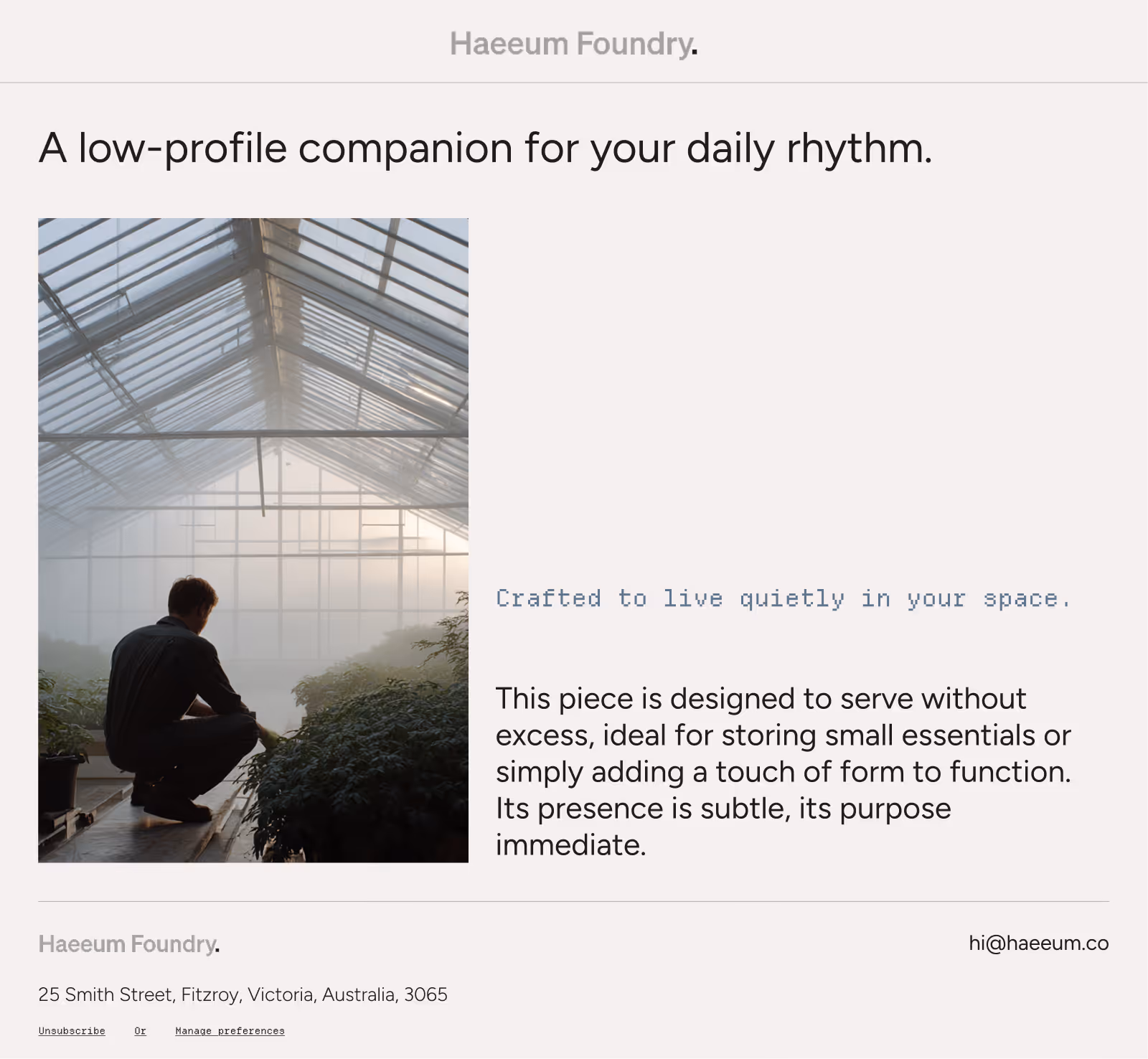 Person squatting inside a greenhouse with fog and plants, viewed from the side in soft light.