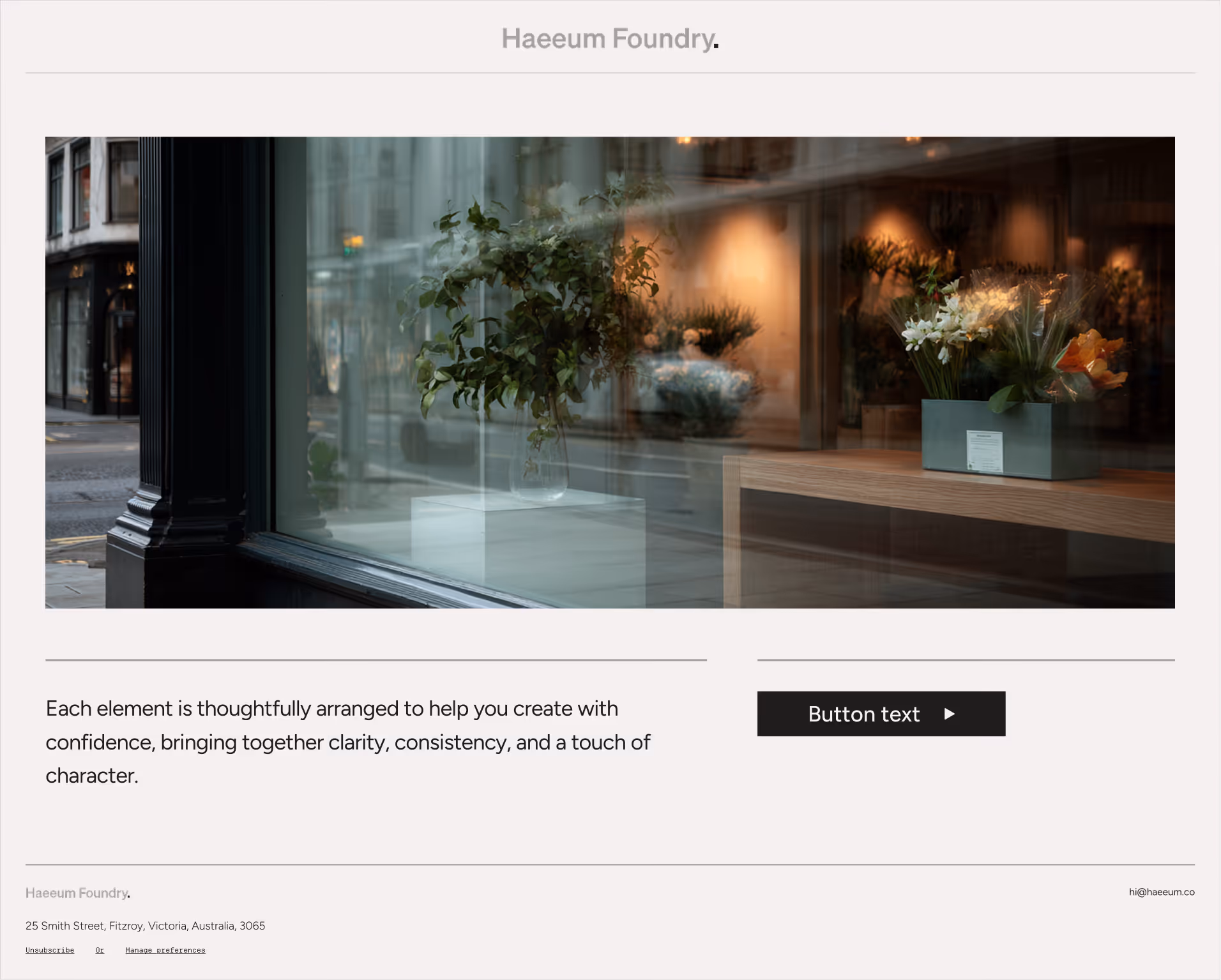 Shop window shows green leafy plant on white pedestal and flowers on wooden table inside.